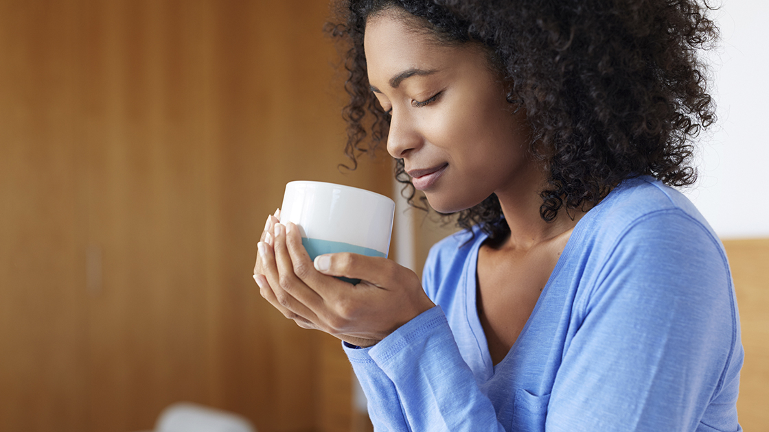 young woman with a cup of tea